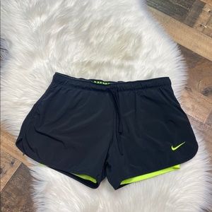 Nike black and green athletic shorts